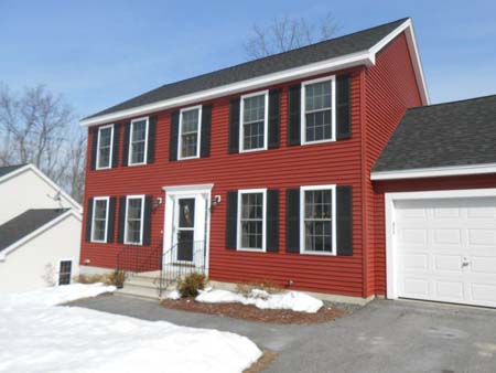 red house in snow